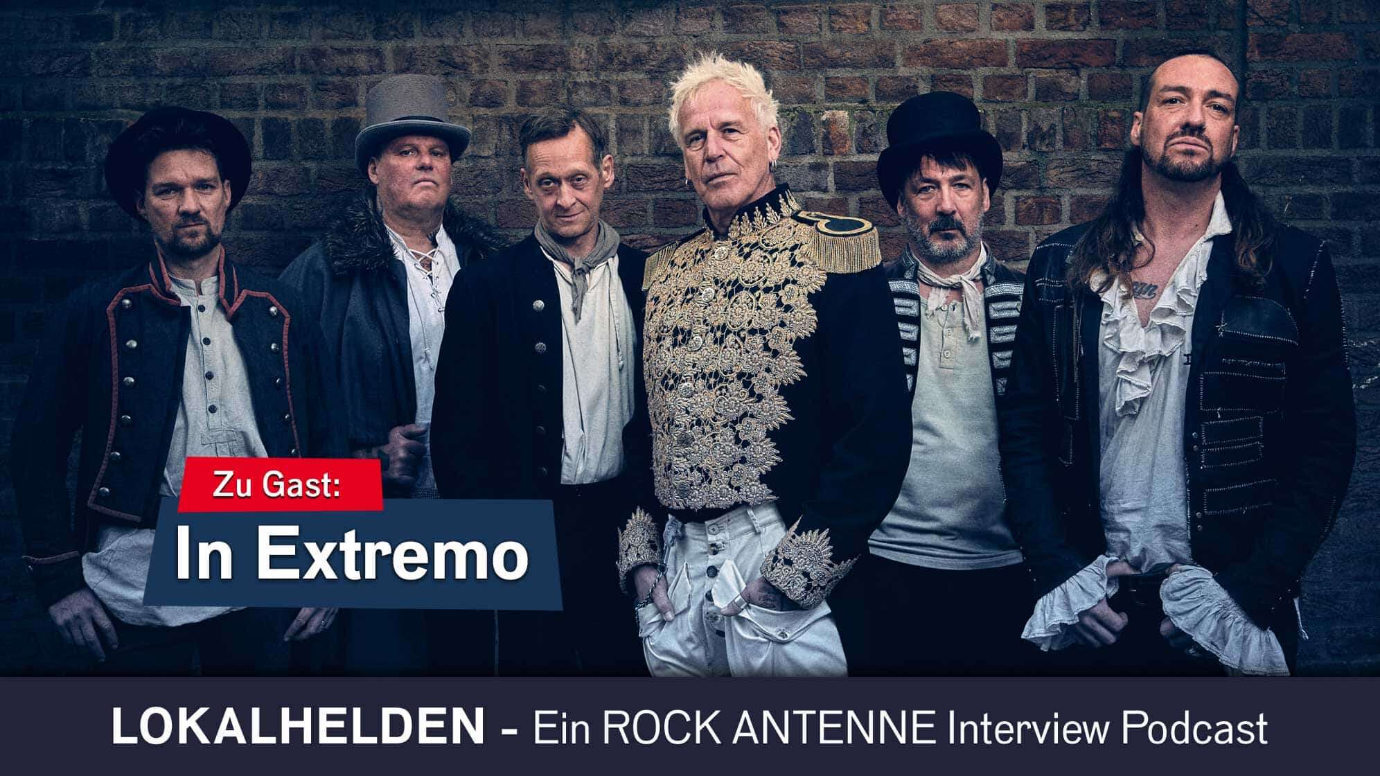 Pressefoto aus dem Jahr 2024 der Band In Extremo, dazu der Text: Lokalhelden - der ROCK ANTENNE Interview Podcast